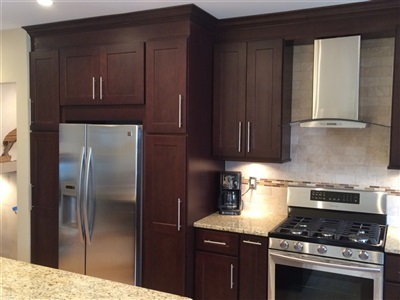 Maspeth Kitchen Ebony cabinet with gaillio ornamental